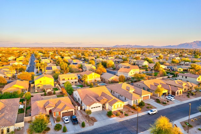 birds eye view of property featuring a mountain view and a residential view