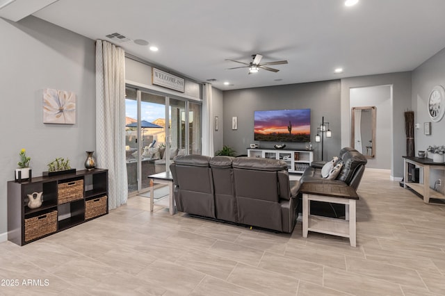 living room with ceiling fan