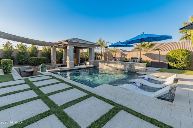 view of pool featuring a patio, a gazebo, and pool water feature