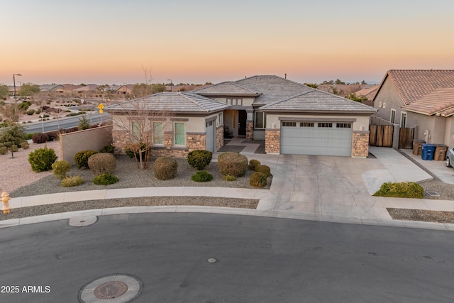 view of front of property featuring a garage