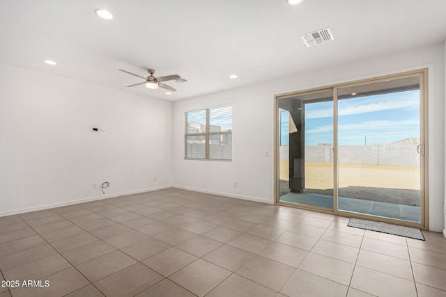 spare room with light tile patterned floors, baseboards, visible vents, ceiling fan, and recessed lighting