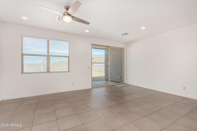 unfurnished room featuring visible vents, baseboards, and recessed lighting