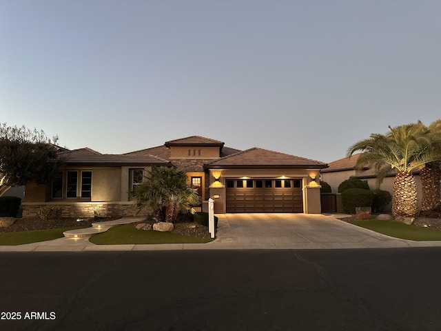 view of front of house with a garage