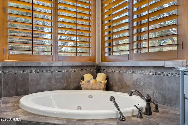 full bathroom with a bath