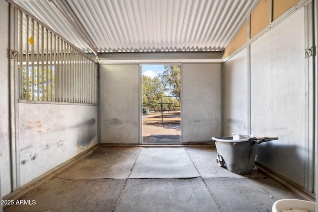 interior space featuring an outdoor structure and an exterior structure