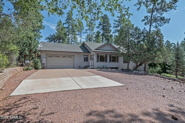 single story home with a garage