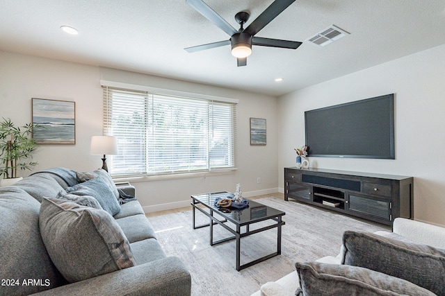 living room with ceiling fan