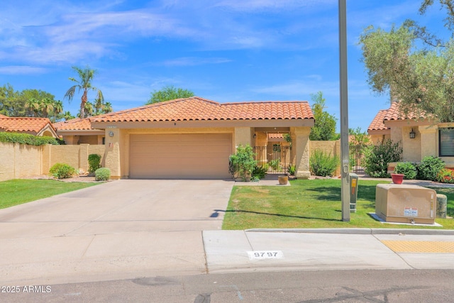 9797 N 100th Pl, Scottsdale, AZ 85258 - mediterranean / spanish home featuring a tile roof, a garage, driveway, and stucco siding
