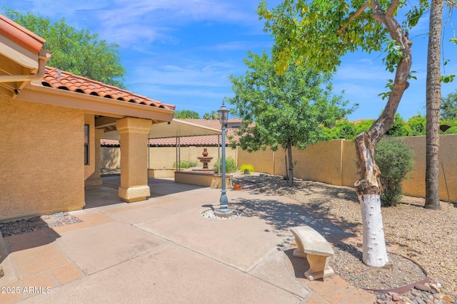 9797 N 100th Pl, Scottsdale, AZ 85258 - fenced backyard with a patio area