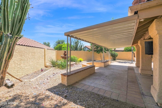 9797 N 100th Pl, Scottsdale, AZ 85258 - fenced backyard featuring a patio