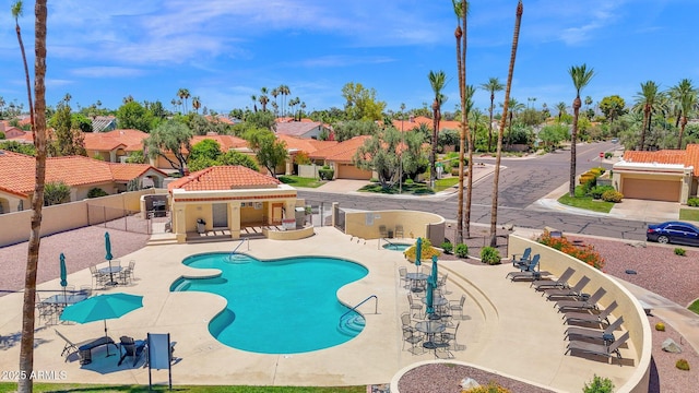 9797 N 100th Pl, Scottsdale, AZ 85258 - community pool featuring a patio area and a residential view
