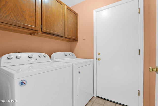 9797 N 100th Pl, Scottsdale, AZ 85258 - laundry area featuring cabinet space, independent washer and dryer, and light tile patterned flooring