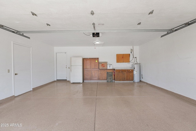 9797 N 100th Pl, Scottsdale, AZ 85258 - garage with freestanding refrigerator, water heater, and a garage door opener