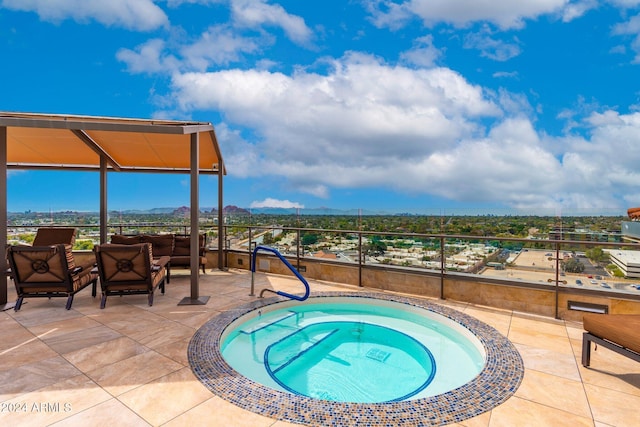 view of swimming pool featuring a patio area, an in ground hot tub, and an outdoor living space