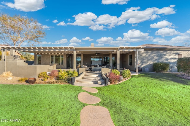 rear view of house with a patio, a pergola, and a lawn