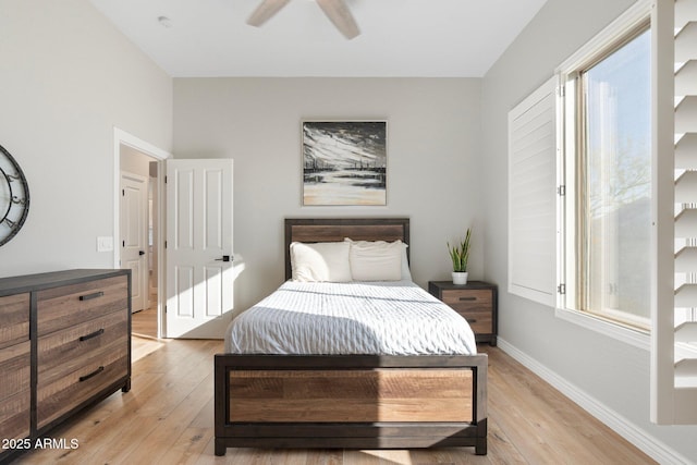 bedroom featuring ceiling fan and light wood-type flooring