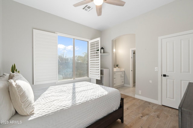 bedroom with light hardwood / wood-style flooring and ceiling fan