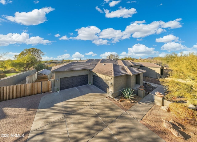 view of front of property featuring a garage