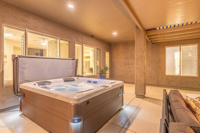 view of patio with an indoor hot tub