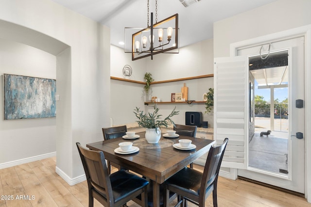 dining space featuring light hardwood / wood-style floors