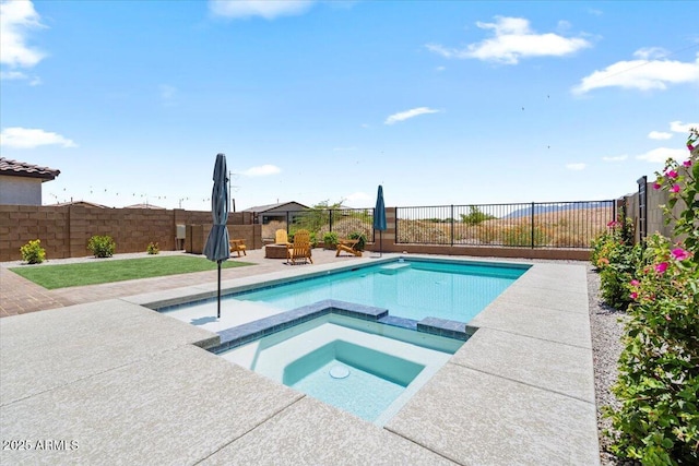 11951 W Wier Ave, Avondale, AZ 85323 - view of swimming pool with a pool with connected hot tub, a fenced backyard, and a patio area