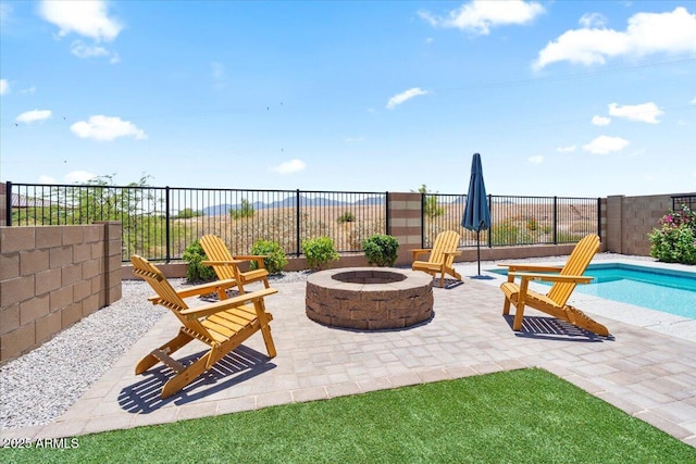 11951 W Wier Ave, Avondale, AZ 85323 - fenced backyard with a fire pit and a patio area