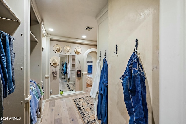 bathroom with hardwood / wood-style flooring