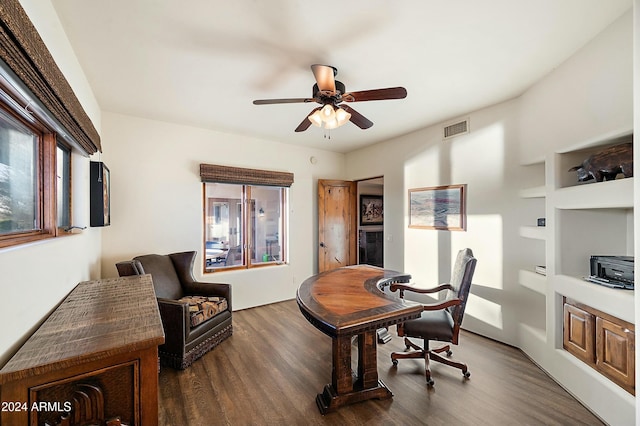 office space featuring dark hardwood / wood-style floors and ceiling fan