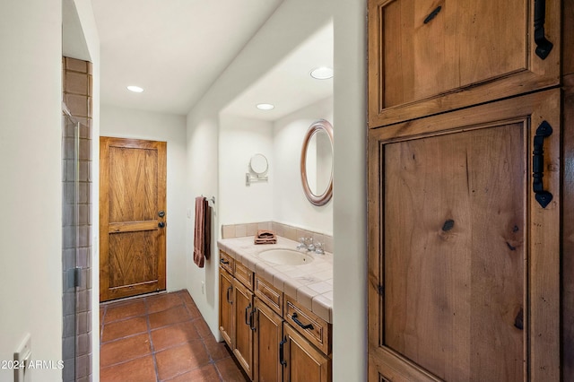 bathroom featuring tile patterned floors and vanity