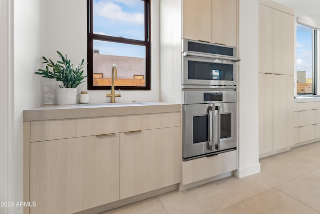 kitchen featuring sink and stainless steel double oven