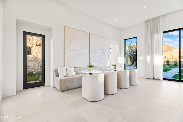 living area with light tile patterned floors