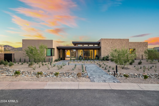 view of front of property with a patio area