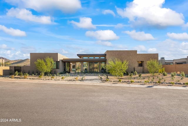 view of pueblo revival-style home