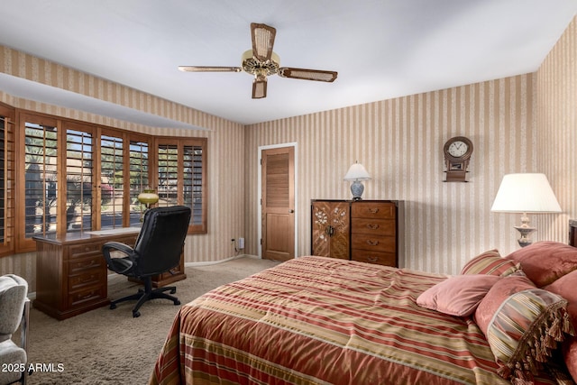 carpeted bedroom featuring ceiling fan