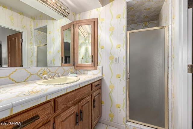 bathroom with vanity and walk in shower