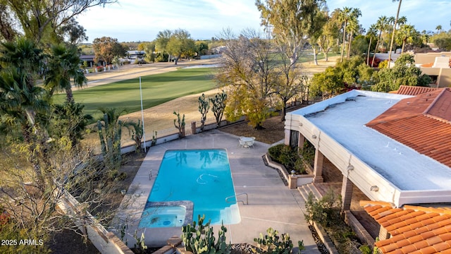 view of pool with a patio and an in ground hot tub