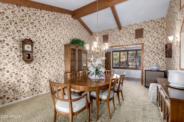 dining space with a chandelier, lofted ceiling with beams, and carpet