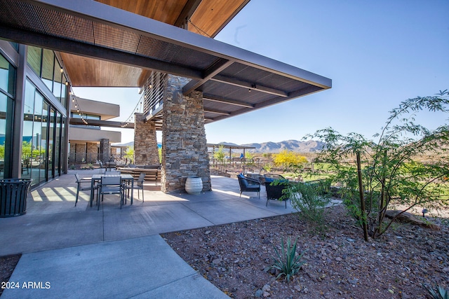 view of patio featuring a mountain view