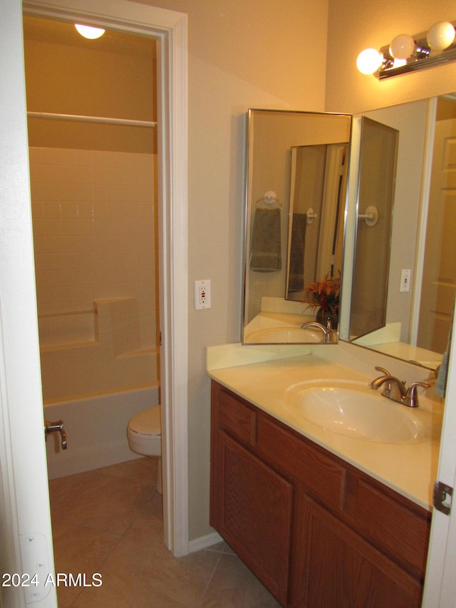 full bathroom with tile patterned floors, vanity, shower / bathing tub combination, and toilet