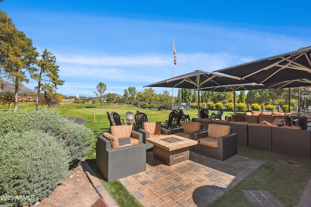 2665 N Valley View Rd Unit 10130, Flagstaff, AZ 86004 - view of patio with an outdoor living space with a fire pit and view of golf course