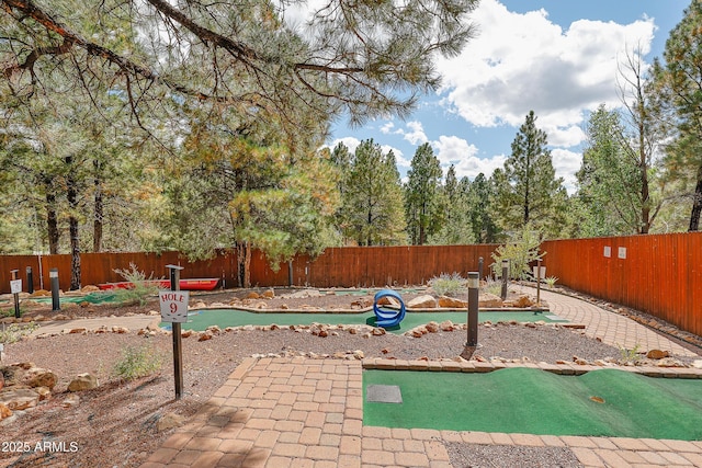 2665 N Valley View Rd Unit 10130, Flagstaff, AZ 86004 - view of pool with a putting area and a fenced backyard