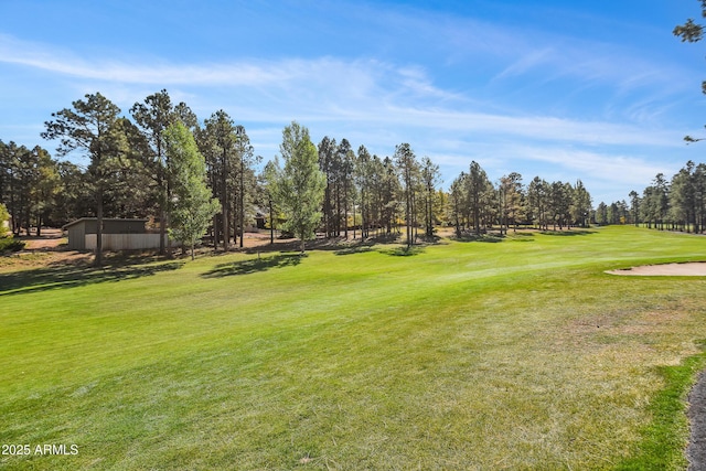 2665 N Valley View Rd Unit 10130, Flagstaff, AZ 86004 - surrounding community with a yard, view of scattered trees, and golf course view