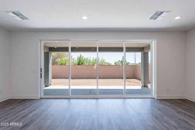 11857 N Luckenbach St, Surprise, AZ 85388 - spare room with baseboards, wood finished floors, and recessed lighting
