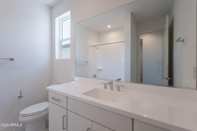 11857 N Luckenbach St, Surprise, AZ 85388 - bathroom with vanity, toilet, and a shower