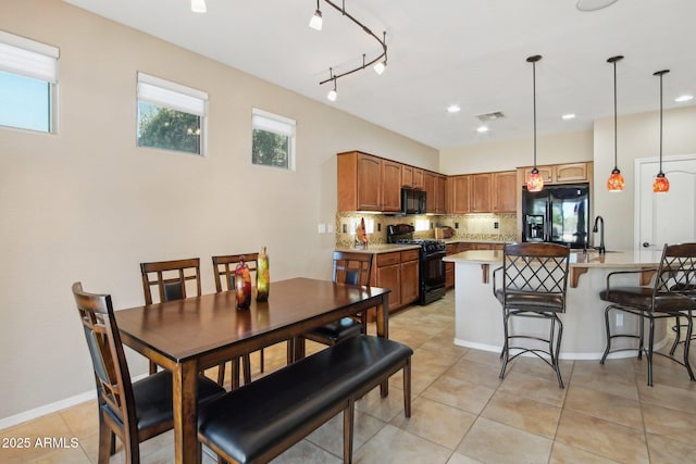 dining area with light tile patterned floors, recessed lighting, and visible vents