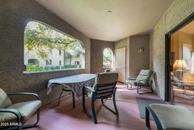 view of patio with a balcony