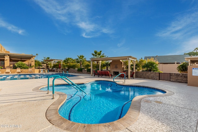 view of pool featuring a patio