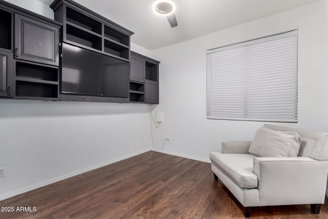 unfurnished room featuring dark hardwood / wood-style floors and ceiling fan