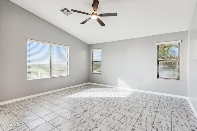 unfurnished room with ceiling fan, a healthy amount of sunlight, and lofted ceiling