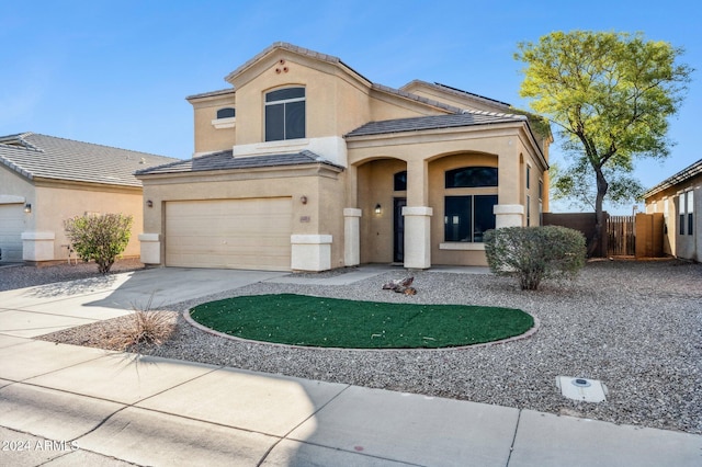 view of front of property featuring a garage